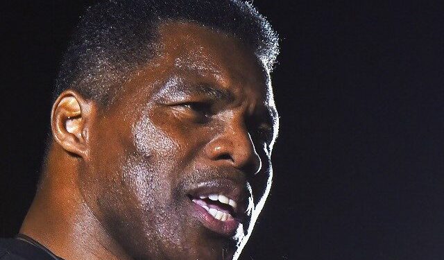 Exclusive — Herschel Walker: Biden ‘Committing an Act of Treason’ with Military Vaccine Mandate