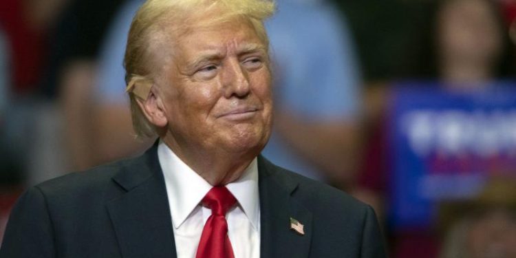 Trump vows to 'heal the world' in wake of Georgia school shooting