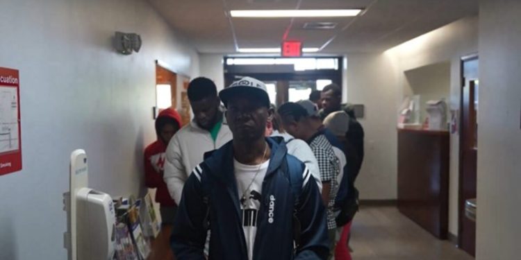 BETRAYAL: Long Lines of Haitians Gather to Gorge on Taxpayer-Funded Benefits in Springfield, Ohio While American Veteran Gets DENIED Medicaid (VIDEO)