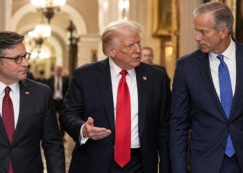 Trump and Colleagues in Government Hallway
